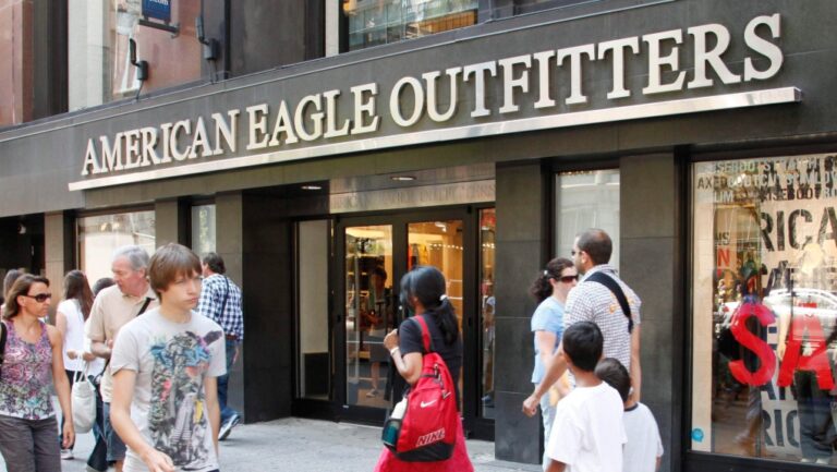In this July 30, 2010 photo, youngsters pass an American Eagle Outfitters clothing store, in New York. (Mark Lennihan / AP Photo)