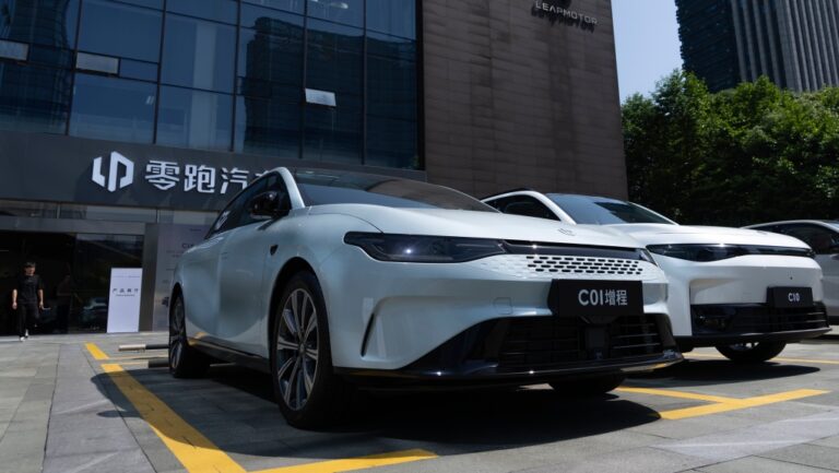 Leapmotor electric vehicles are parked outside a showroom in Hangzhou, China on May 14, 2024. (Caroline Chen / AP)