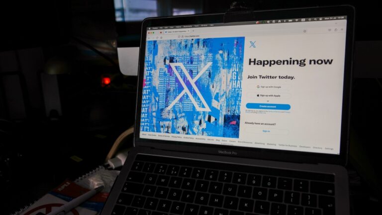 FILE - A view of a laptop shows the Twitter sign-in page with their logo, in Belgrade, Serbia, Monday, July 24, 2023. (Darko Vojinovic / AP Photo, File)
