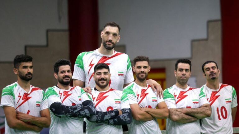 Morteza Mehrzadselakjani (top centre) poses for a picture with his Iranian teammates during a training session of the men's sitting volleyball team ahead of the 2024 Paralympics Paris Games. (Atta Kenare/AFP/Getty Images via CNN Newsource)