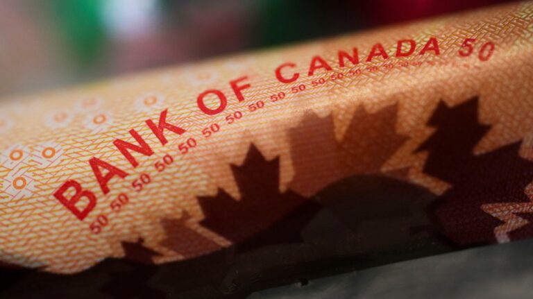 Bank of Canada wording on a Canadian $50 bill is pictured in Ottawa on Wednesday, Jan.11, 2023. (Sean Kilpatrick / The Canadian Press)