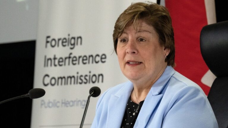 Commissioner Justice Marie-Josee Hogue speaks about the interim report following its release at the Public Inquiry Into Foreign Interference in Federal Electoral Processes and Democratic Institutions, in Ottawa, Friday, May 3, 2024. THE CANADIAN PRESS/Adrian Wyld