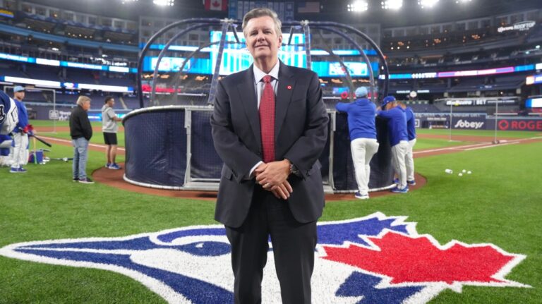 Rogers Communications Inc. executive chair Edward Rogers stands on the field in Toronto on Monday, April 8, 2024. (Chris Young / The Canadian Press)