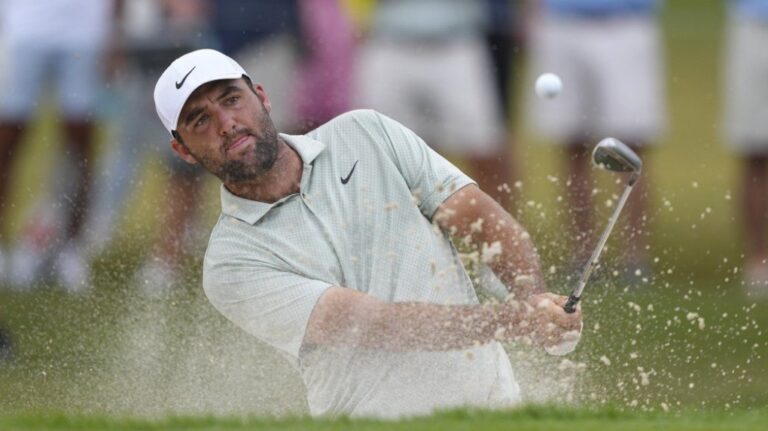 Scottie Scheffler hits from a bunker on the sixth hole during the final round of the Tour Championship golf tournament, Sunday, Sept. 1, 2024, in Atlanta. (Jason Allen/AP Photo)
