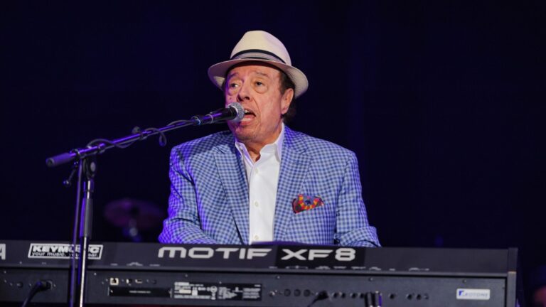 Brazilian singer and pop artist, Sergio Mendes seen here performing in 2015, dead at 83. (Dimitri Hakke/Redferns/Getty Images via CNN Newsource)