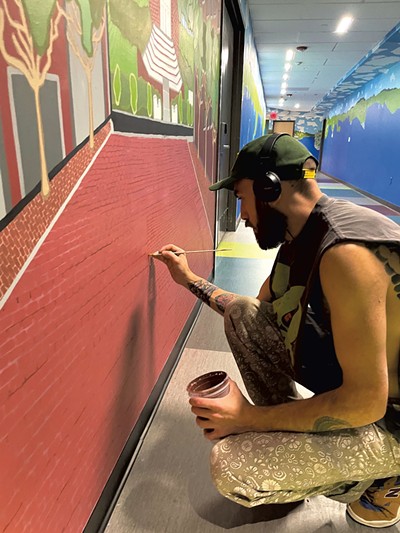 Jake Barakat peignant une vue de Church Street - ALICE DODGE ©️ SEVEN DAYS