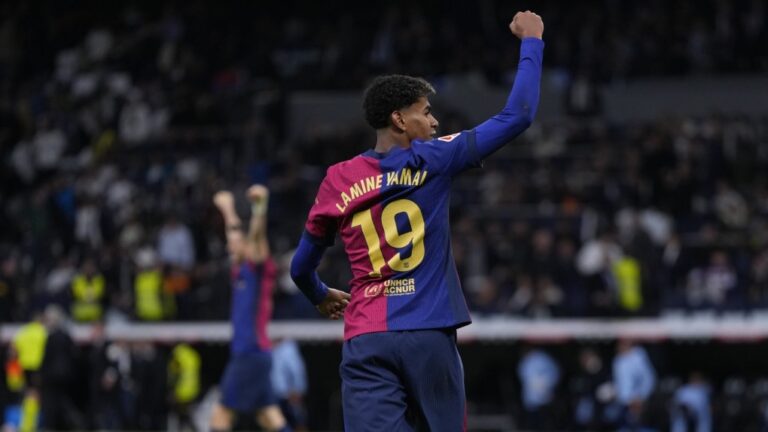 Barcelona's Lamine Yamal celebrates after a soccer match between Real Madrid and Barcelona in Madrid, Spain, Saturday, Oct. 26, 2024. (AP Photo/Manu Fernandez)
