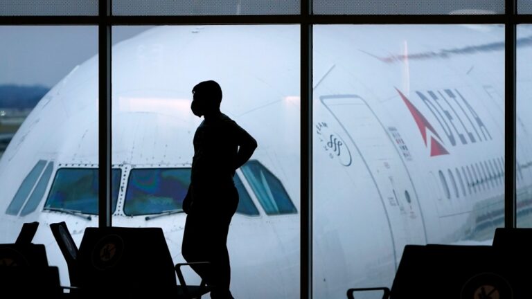 Delta Airlines flight at Hartsfield-Jackson International Airport in Atlanta on Feb. 18, 2021. (AP Photo/Charlie Riedel, File)