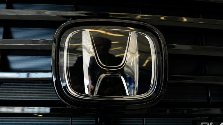 The company logo adorms the grille of a vehicle on Wednesday, May 1, 2024, in Highlands Ranch, Colo. (AP Photo/David Zalubowski)