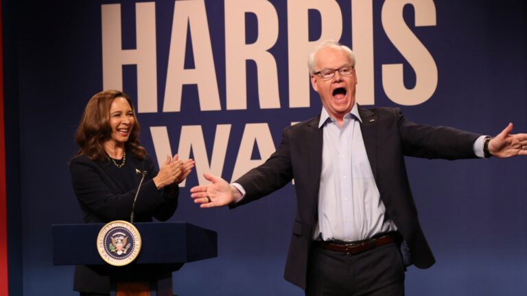 This image released by NBC shows Maya Rudolph as Kamala Harris, left, and Jim Gaffigan as Tim Walz, during the cold open sketch on "Saturday Night Live" in New York on Saturday, Sept. 28, 2024. (Will Heath/NBC via AP)
