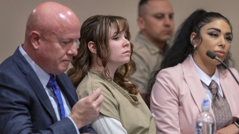Hannah Gutierrez-Reed, centre, with her attorney Jason Bowles, left, and paralegal Carmella Sisneros, right, prepare for a sentencing hearing on April 15, 2024. (Eddie Moore/The Albuquerque Journal via AP, Pool, File)