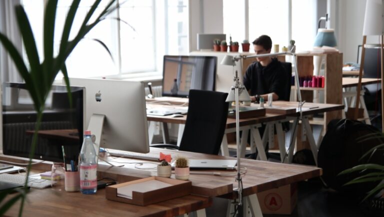 A stock photo of someone working in an office. (Pexels/Marc Mueller)