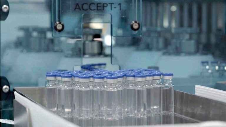 Vials of freshly manufactured Novavax COVID-19 vaccines wait to be labelled in 2022, in Pune, India. (Serum Institute of India for Novavax via AP)
