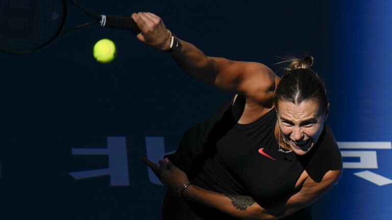 Aryna Sabalenka of Belarus serves against Madison Keys of the United States during their women's singles match of the China Open tennis tournament, at the National Tennis Center in Beijing, Wednesday, Oct. 2, 2024. (AP Photo/Andy Wong)
