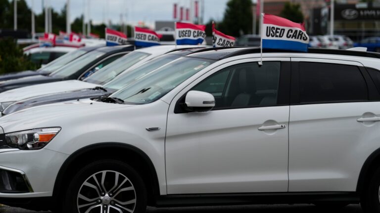 Used vehicles for sale are displayed at an automotive dealership in Ottawa on Friday, Aug. 11, 2023. THE CANADIAN PRESS/Sean Kilpatrick