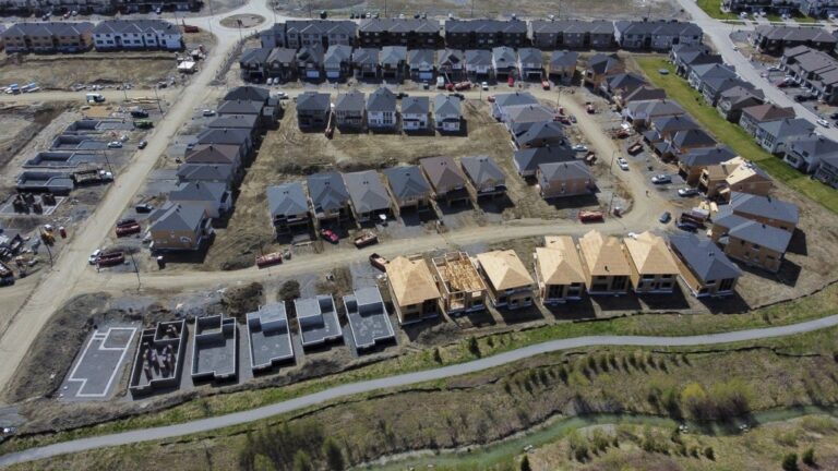 Housing experts who have long promoted moving new home construction from suburbs to urban centres are calling for a similar approach to policy in Canada. (Sean Kilpatrick/The Canadian Press)