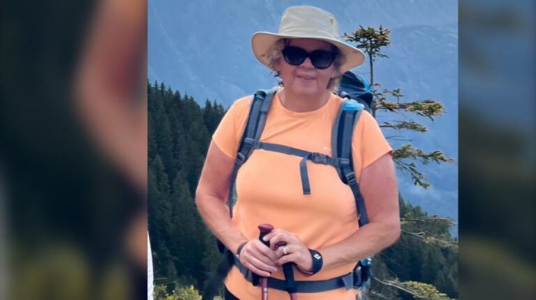 Lorraine O'Quinn poses during a five-day hike through the French Alps in September 2024 after she drastically changed her diet and lifestyle. (Lorraine O'Quinn)