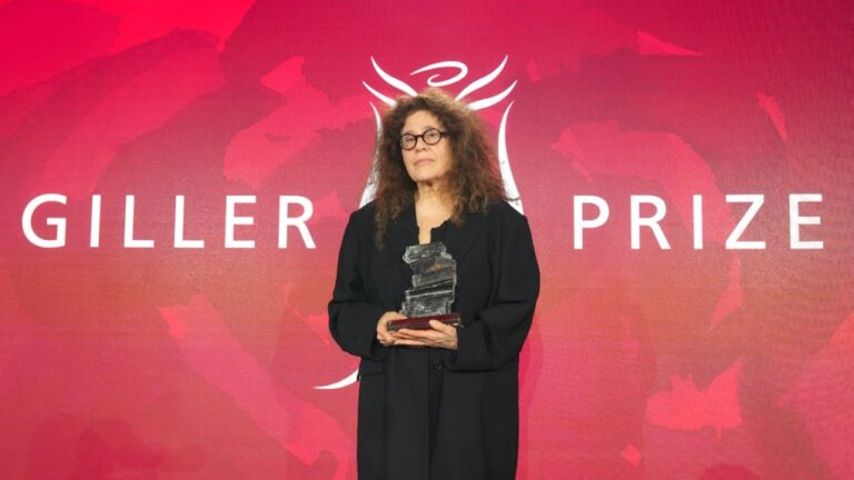 Anne Michaels accepts the Giller Prize for her book "Held' at a ceremony in Toronto, Nov. 18, 2024. THE CANADIAN PRESS/Chris Young