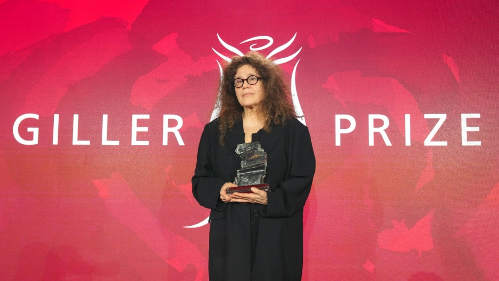 Anne Michaels accepts the Giller Prize for her book "Held' at a ceremony in Toronto, Nov. 18, 2024. THE CANADIAN PRESS/Chris Young