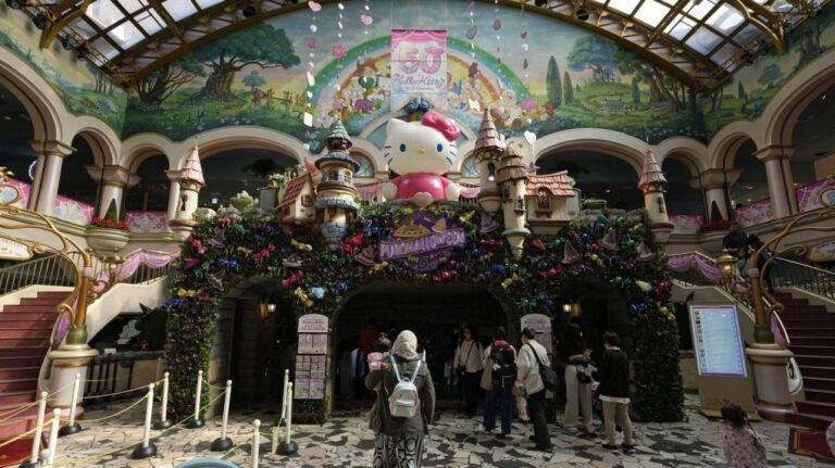 A Hello Kitty figure welcomes visitors at Sanrio Puroland during her 50th birth anniversary celebrations in Tama, a western suburb of Tokyo, Japan, Friday, Nov. 1, 2024. (AP Photo/Hiro Komae)