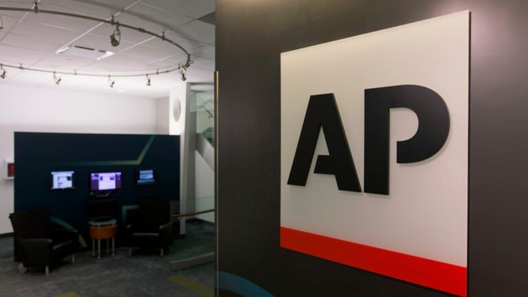 A logo for The Associated Press is seen at its headquarters in New York on Tuesday, April 26, 2016. (AP Photo/Hiro Komae)