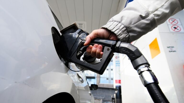 A person pumps gas at a gas station in Mississauga, Ont., Feb. 13, 2024. THE CANADIAN PRESS/Christopher Katsarov