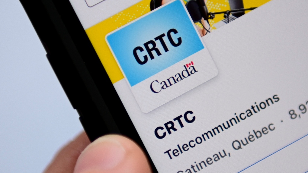 A person navigates to the social media pages of the Canadian Radio-television and Telecommunications Commission on a cellphone in Ottawa on Monday, May 17, 2021. THE CANADIAN PRESS/Sean Kilpatrick
