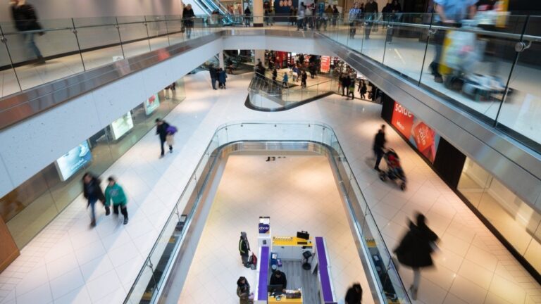 People make their way around the Rideau Center shopping centre on Boxing Day in Ottawa, Monday, Dec. 26, 2022. THE CANADIAN PRESS/Spencer Colby