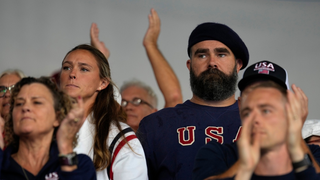 Recently retired Philadelphia Eagles lineman Jason Kelce and wife Kylie watch a women's field hockey match Saturday, July 27, 2024, in Colombes, France. (AP Photo/Anjum Naveed)