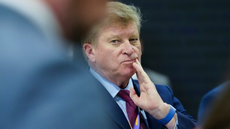Tom Clark, Consul General of Canada in New York, United States, listens in as Prime Minister Justin Trudeau talks to the media in Philadelphia on Tuesday, May 21, 2024. THE CANADIAN PRESS/Sean Kilpatrick