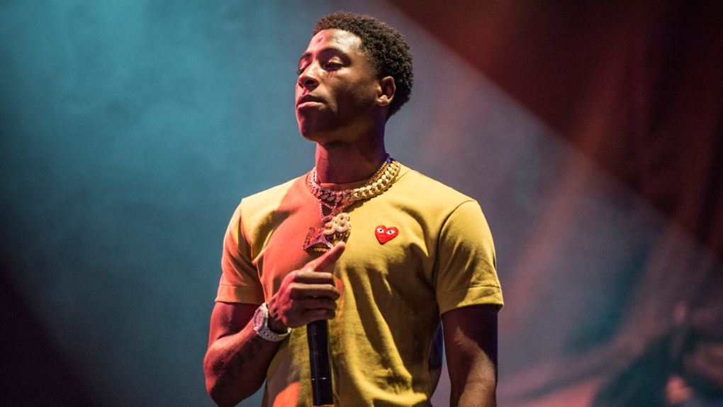 FILE - In this Aug. 25, 2017, file photo, NBA YoungBoy performs at the Lil' WeezyAna Fest at Champions Square in New Orleans. (Photo by Amy Harris/Invision/AP)