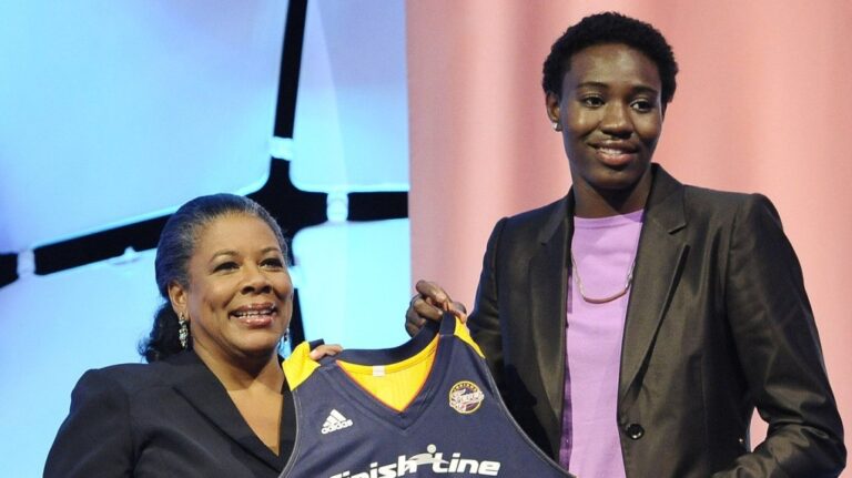 Florida State's Natasha Howard holds up an Indiana Fever jersey with WNBA president Laurel J. Richie after Indiana selected Howard as the No. 5 pick in the WNBA basketball draft in, April 14, 2014, in Uncasville, Conn. (AP Photo/Jessica Hill, File)