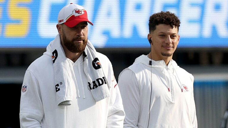 Travis Kelce and Patrick Mahomes of the Kansas City Chiefs look on from the sidelines during a game against the Los Angeles Chargers at SoFi Stadium in Inglewood, California, on January 7. (Harry How/Getty Images/File via CNN Newsource)