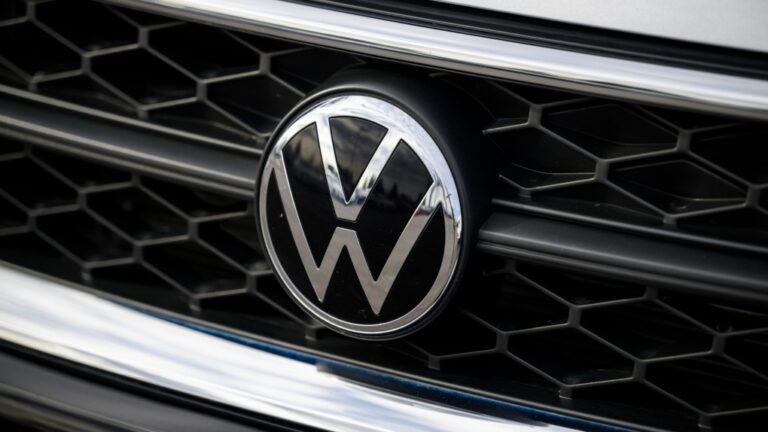 The Volkswagen emblem is seen on a vehicle for sale at a dealership in Ottawa, April 20, 2023. THE CANADIAN PRESS/Justin Tang