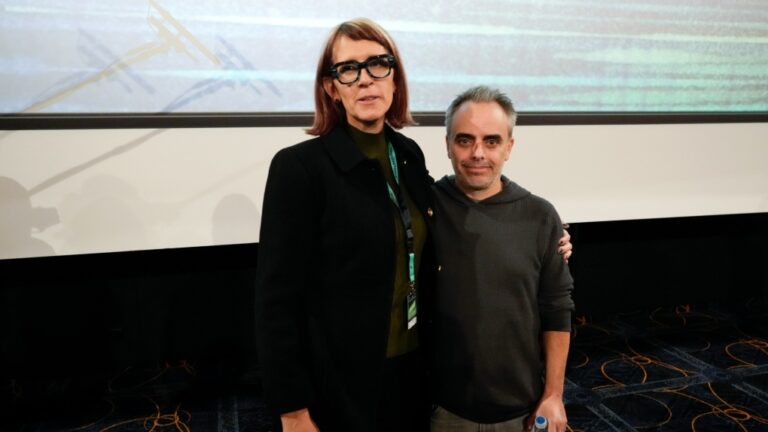 Director Joel Souza, right, and cinematographer Bianca Cline pose for media after the premiere of the film 'Rust' during the 32nd Camerimage International Film Festival in Torun, Poland, Nov. 20, 2024. (AP Photo/Czarek Sokolowski)