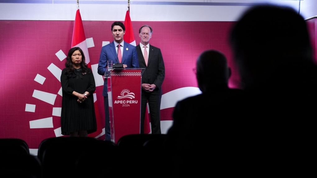 Prime Minister Justin Trudeau holds a closing press conference with Minister Mary Ng and Ian McKay, Ambassador of Canada to Japan and Special Envoy for the Indo-Pacific, in Lima, Peru on Saturday, Nov. 16, 2024. THE CANADIAN PRESS/Sean Kilpatrick