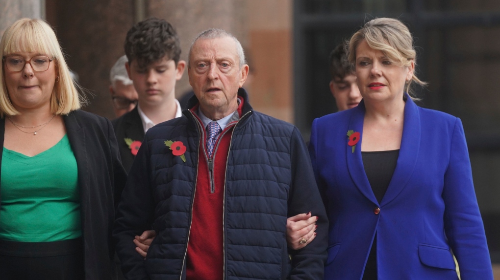 Patrick O'Hara, centre, and family members leave Newcastle Crown Court, in Newcastle, England, Wednesday, Nov. 6, 2024 where Dr. Thomas Kwan, was sentenced to 31 years and five months after he attempted to murder Mr O'Hara, who was his mother's partner, with a poisoned fake COVID jab whilst disguised as a nurse. (Owen Humphreys/PA via AP)