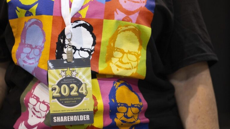 Shareholder Tina Schmidt of Cozad, Neb., wears a shirt with Warren Buffett's portrait in the style of an Andy Warhol painting at the Berkshire Hathaway annual meeting on May 4, 2024, in Omaha, Neb. (AP Photo/Rebecca S. Gratz, File)