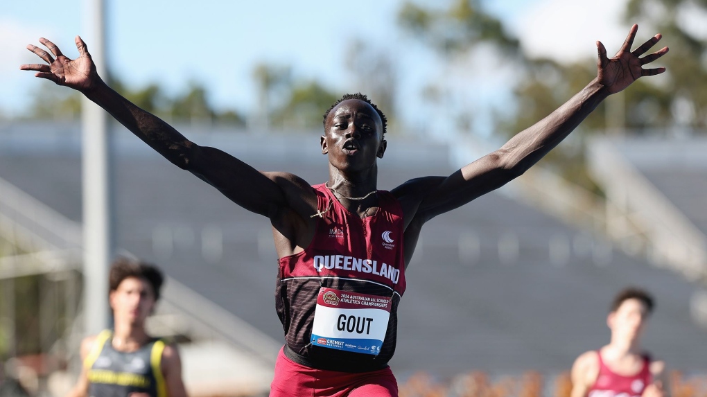 Gout Gout celebrates winning the Boys' U18 100m final at the 2024 Chemist Warehouse Australian All-Schools Athletics Championship in Brisbane. (Cameron Spencer / Getty Images via CNN Newsource)