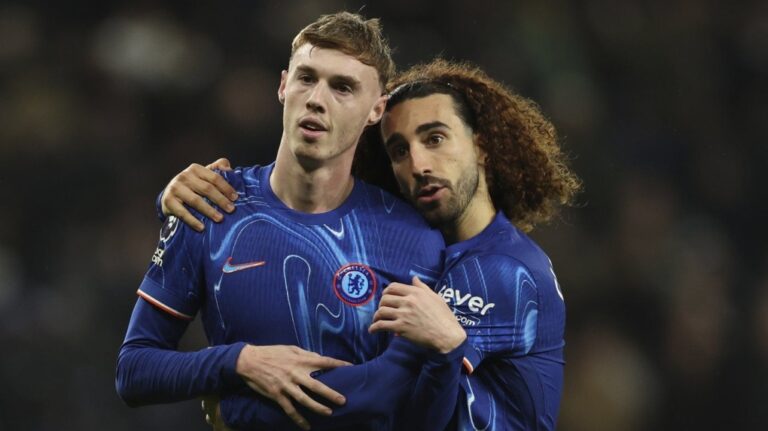Chelsea's Cole Palmer celebrates with his teammate Marc Cucurella in London, Sunday, Dec.8, 2024. (AP Photo/Ian Walton)