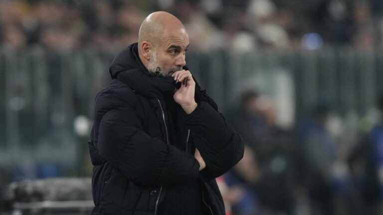 Manchester City's head coach Pep Guardiola watches his players during the match against Juventus in Turin, Italy, Tuesday, Wednesday, Dec.11, 2024. (AP Photo/Luca Bruno)