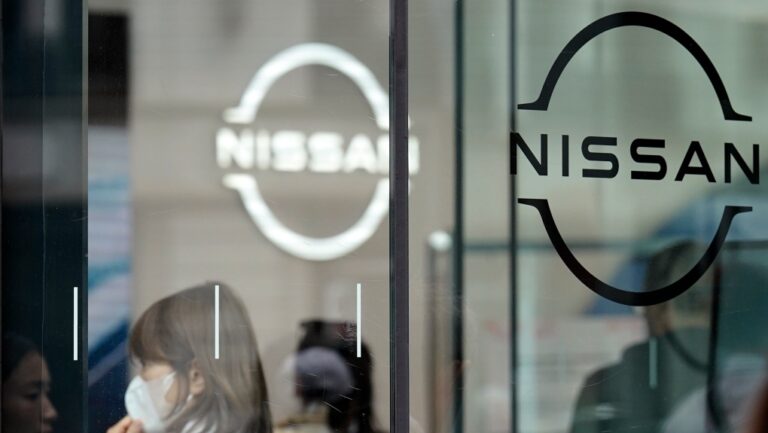 Logos at a Nissan showroom are seen in Ginza shopping district in Tokyo, March 31, 2023. (AP Photo/Eugene Hoshiko, File)