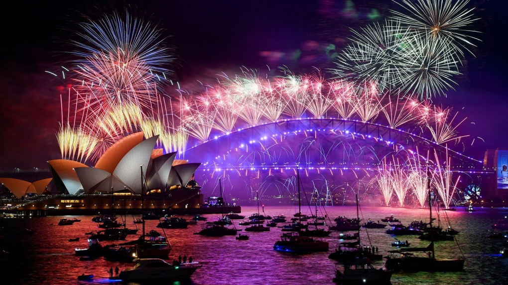 Fireworks explode over Sydney Harbour during New Year's Eve celebrations in Sydney, Australia, in January 2022. (Jaimi Joy/Reuters via CNN Newsource)