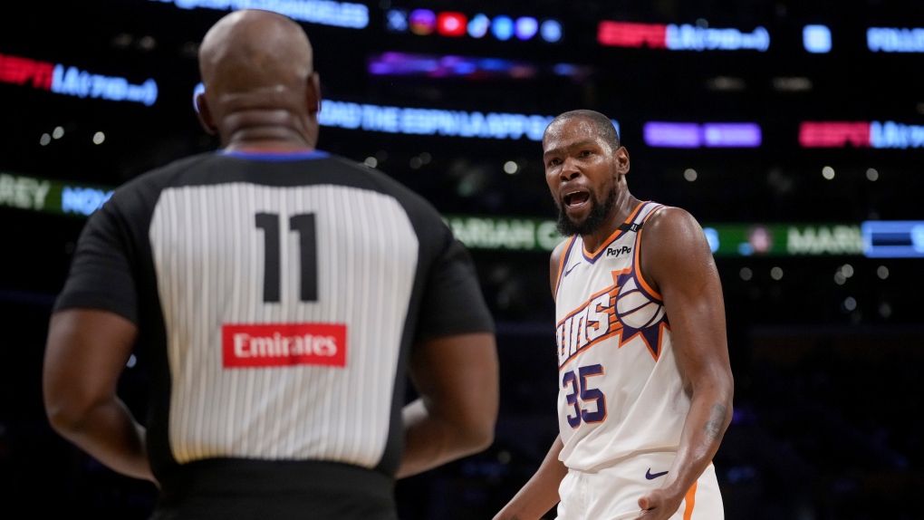 Phoenix Suns forward Kevin Durant (35) argues a call during the second half of an NBA basketball game against the Los Angeles Lakers in Los Angeles, Friday, Oct. 25, 2024. (AP Photo/Eric Thayer)