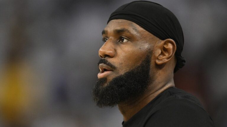Los Angeles Lakers forward LeBron James stands on the court during warm ups before an NBA basketball game against the Golden State Warriors Wednesday, Dec. 25, 2024, in San Francisco. (Eakin Howard/AP Photo)