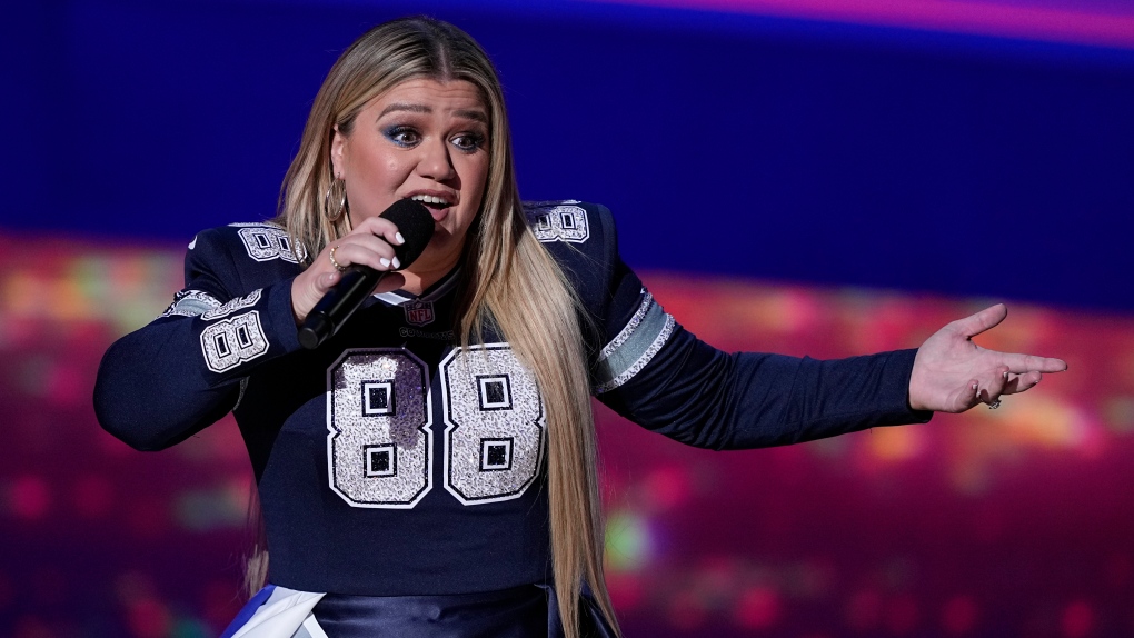 Host, Kelly Clarkson performs during the NFL Honors award show ahead of the Super Bowl 57 football game,Thursday, Feb. 9, 2023, in Phoenix. (AP Photo/David J. Phillip)