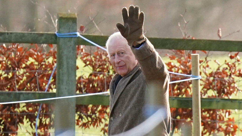 King Charles III waves to well-wishers as he leaves following a Sunday church service at St Mary Magdalene Church in Sandringham, England, Sunday, Dec. 22, 2024. (Jacob King/PA via AP)