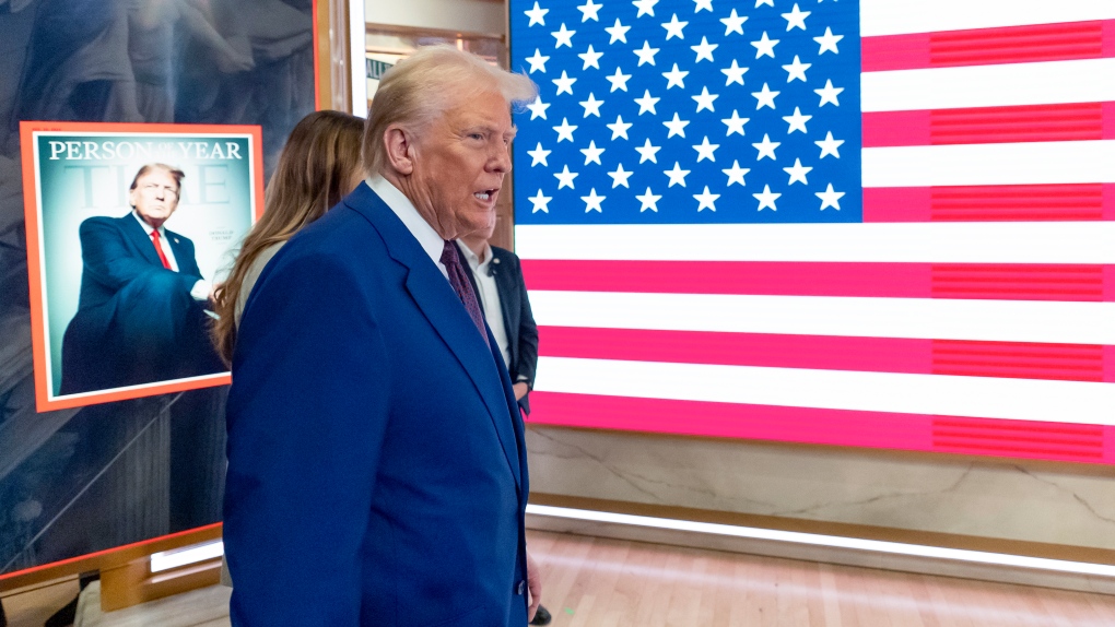 Trump arrives on the floor of the New York Stock Exchange after ringing the opening bell, Thursday, Dec. 12, 2024, in New York. (THE CANADIAN PRESS/AP/Alex Brandon)