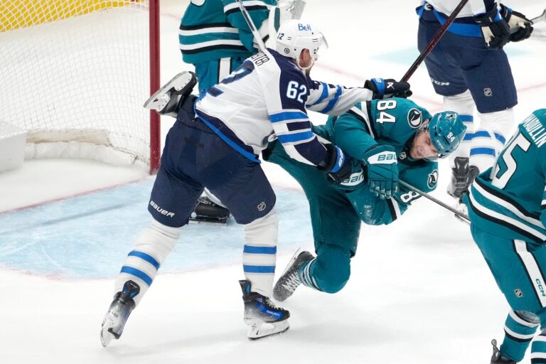 Lowry marque un but tardif pour aider les Jets à battre les Sharks 4-3