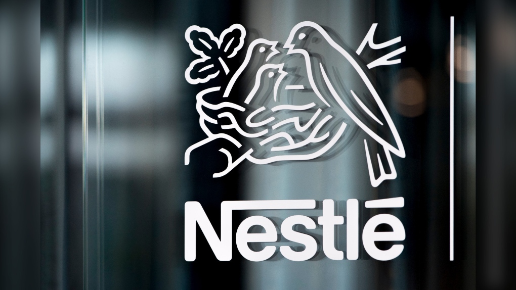 Nestle's logo is displayed on a window in Vevey, Switzerland on Feb. 14, 2019. (Laurent Gillieron / Keystone via AP)
